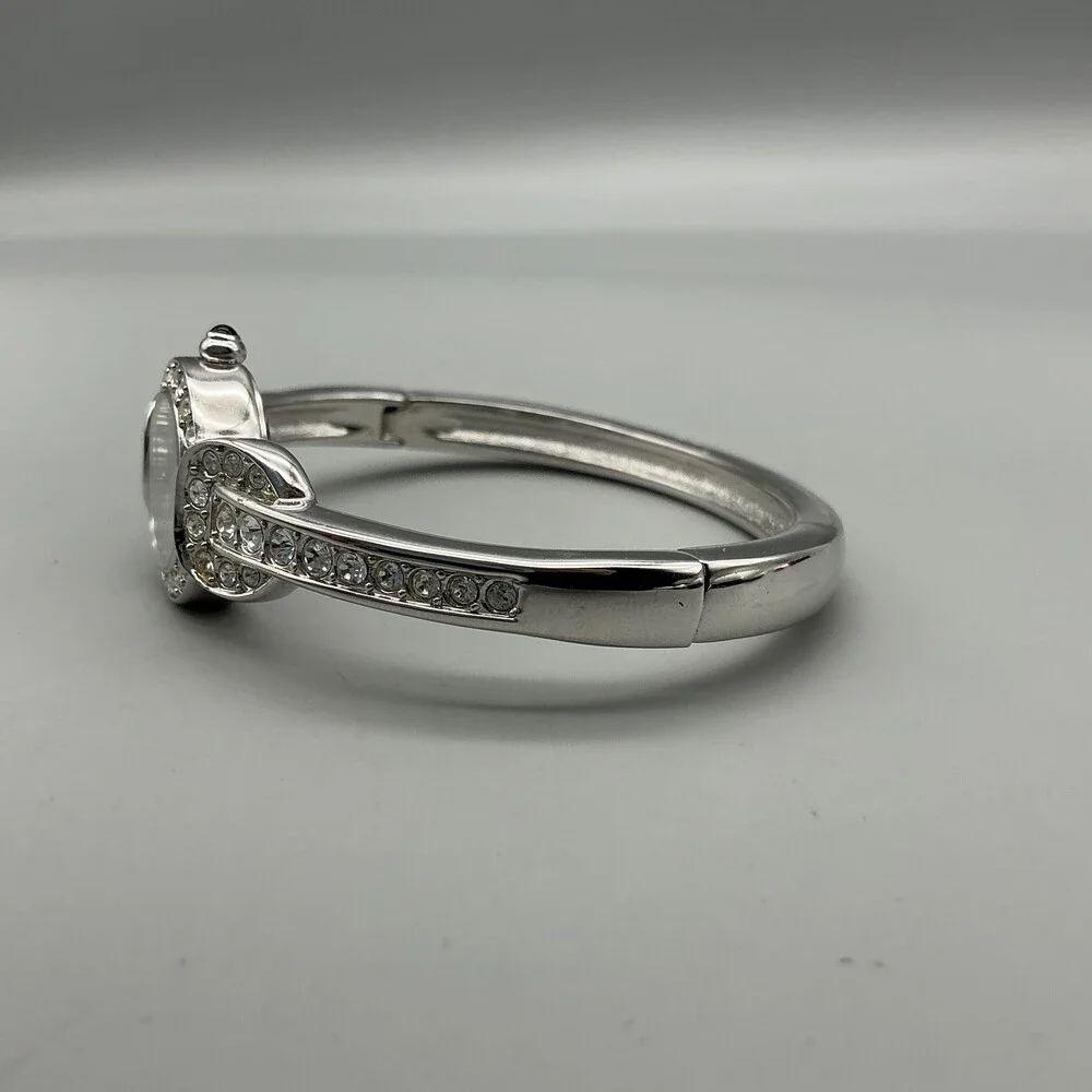 Nolan Miller Womens Watch 21mm Silver Tone MOP Dial Bangle Crystals 7